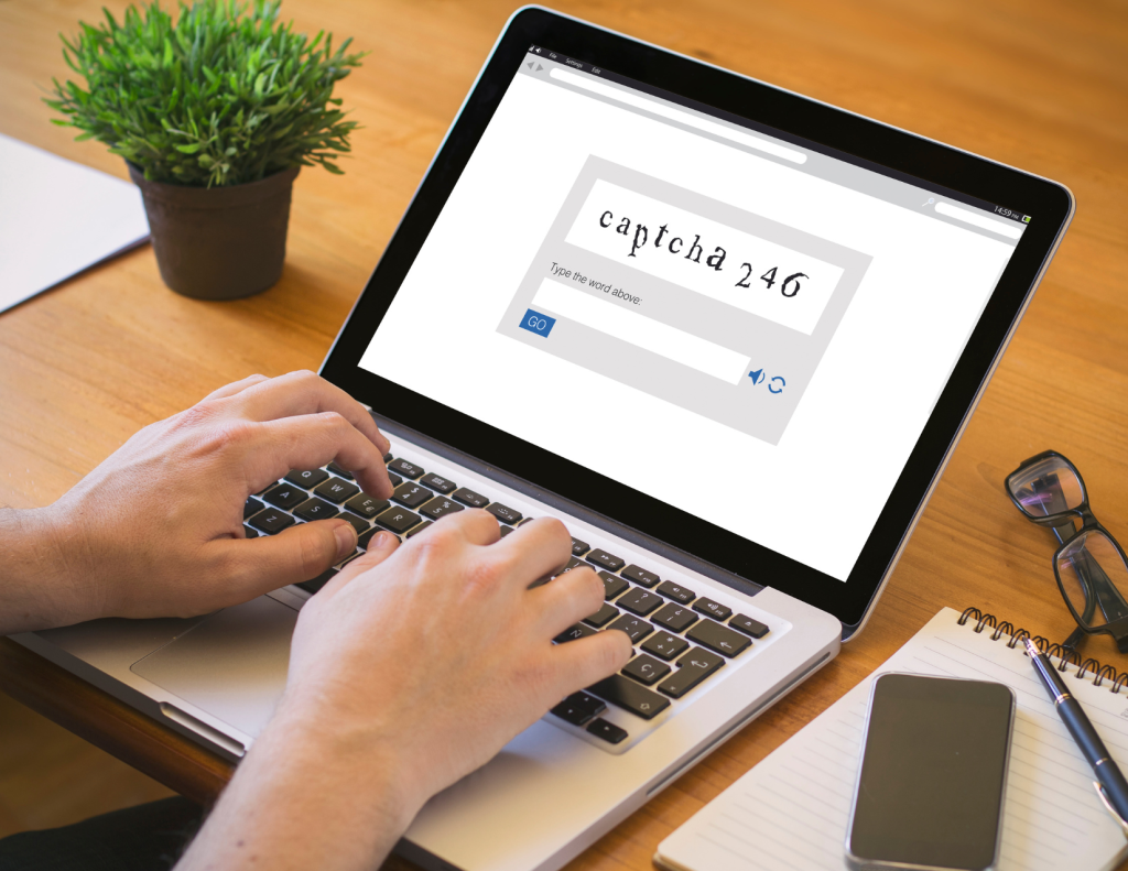 Fake CAPTCHA Image on Laptop
